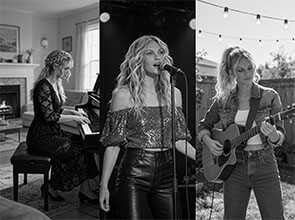 Tatty playing piano, singing,strumming her acoustic